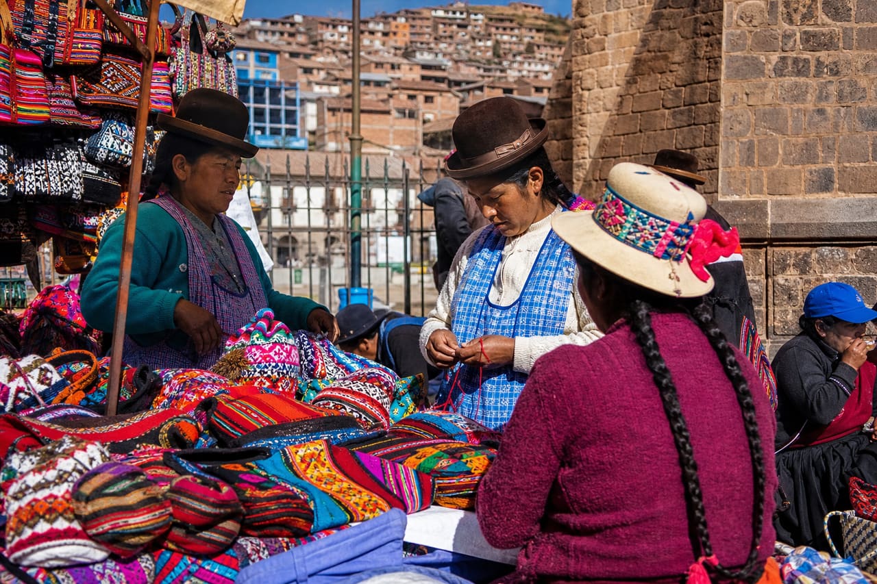 Vibrant Local Market in Puno Featuring Alpaca Wool Textiles
