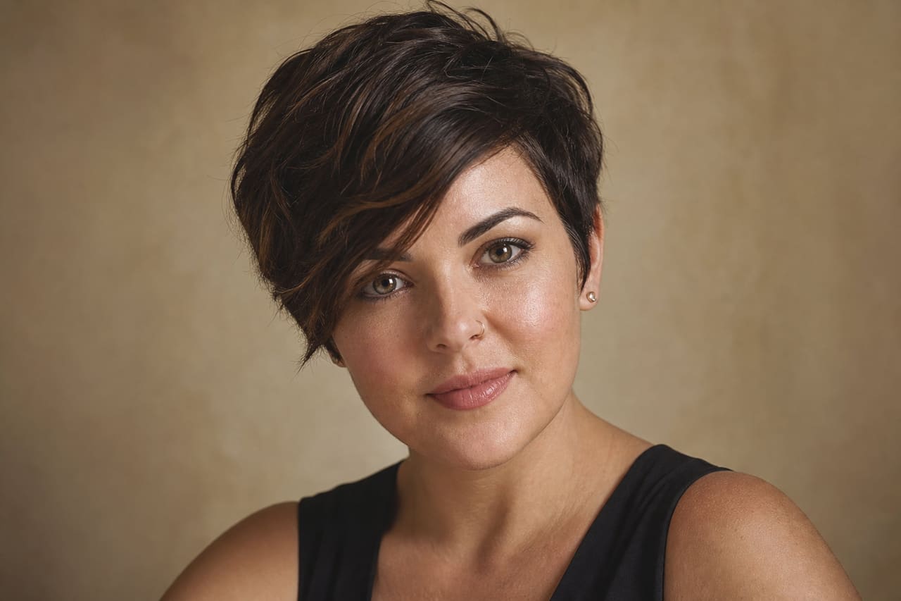 Woman with a Textured Pixie Cut for Round Faces