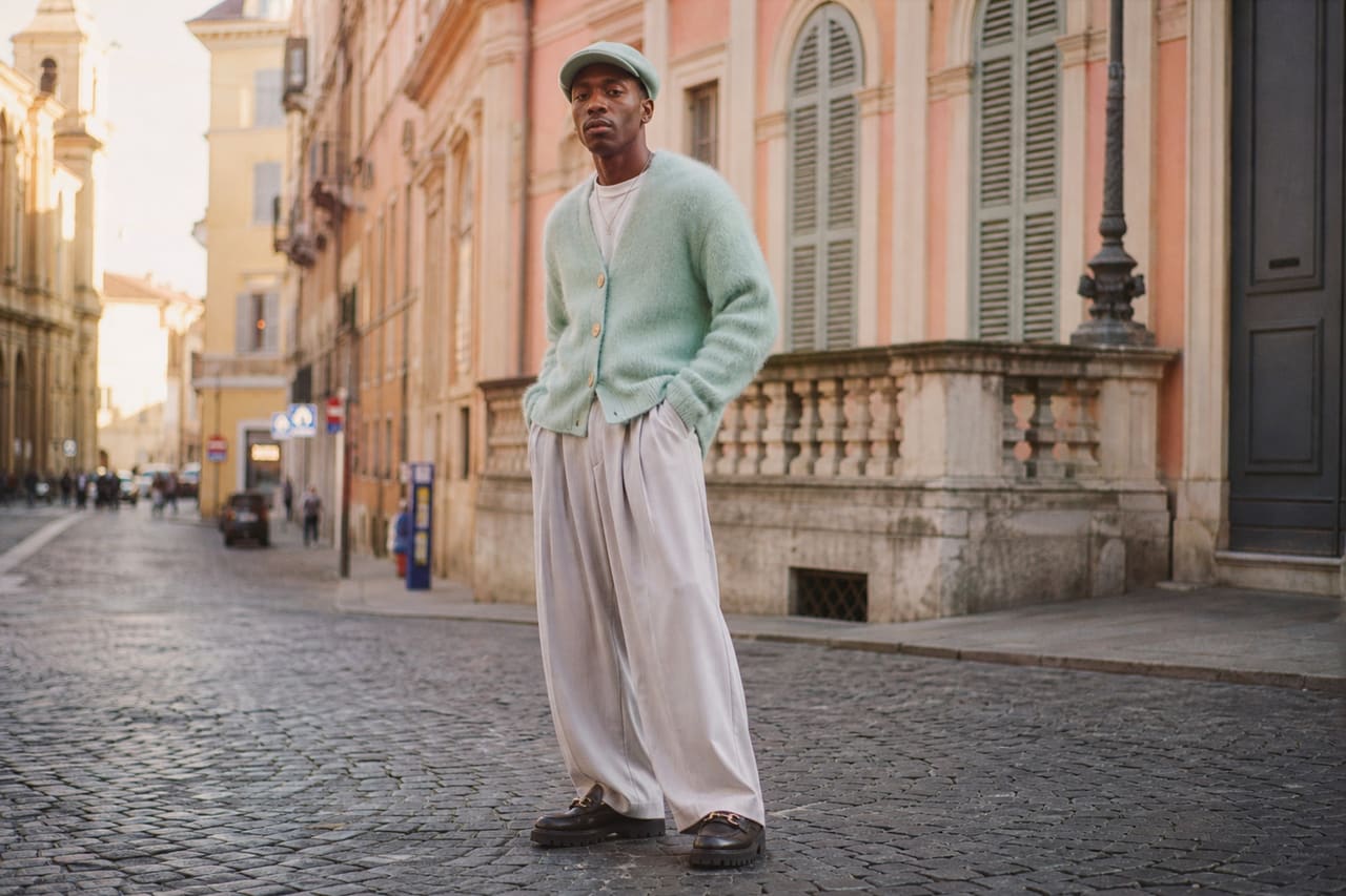 Stylish Man Wearing Eclectic Pastel Outfit on European Street
