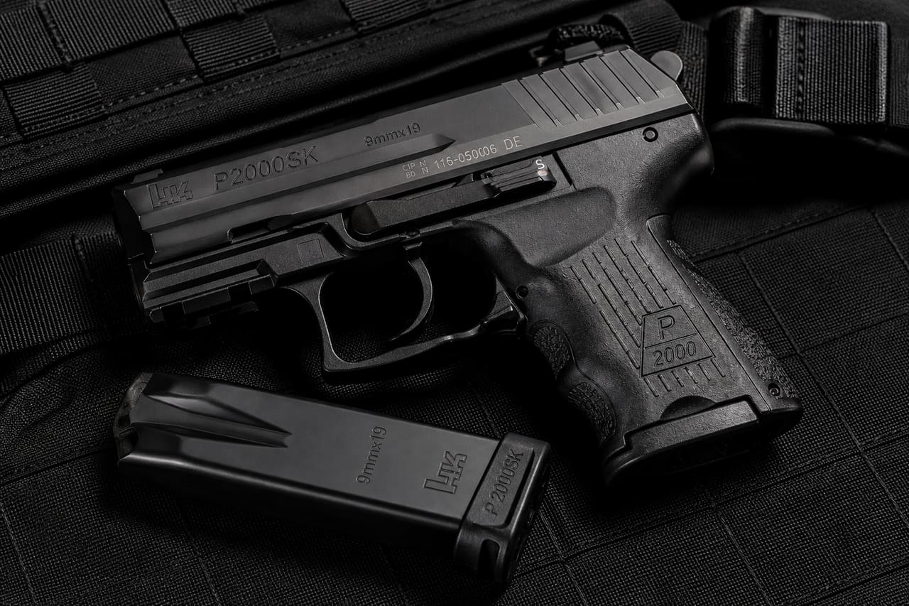 P2000sk Magazine and Handgun on a Tactical Gear Table