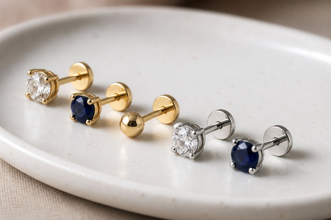 Threadless Push Back Earrings on a White Ceramic Tray