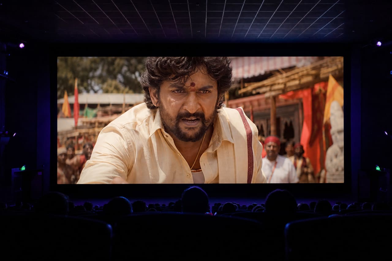 Audience Watching a Dramatic Scene in a Kannada Movie