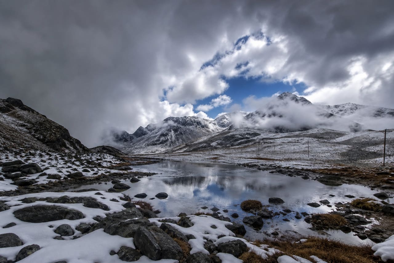 Dramatic Storm Clouds and Snow at Sela Pass