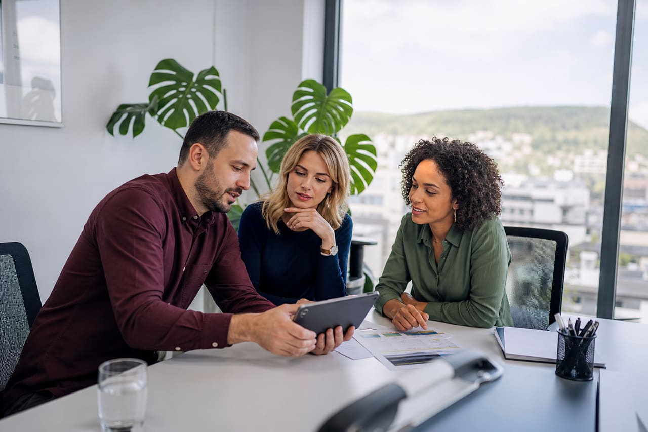 Professional Team Collaborating in a Modern Office in Gwent