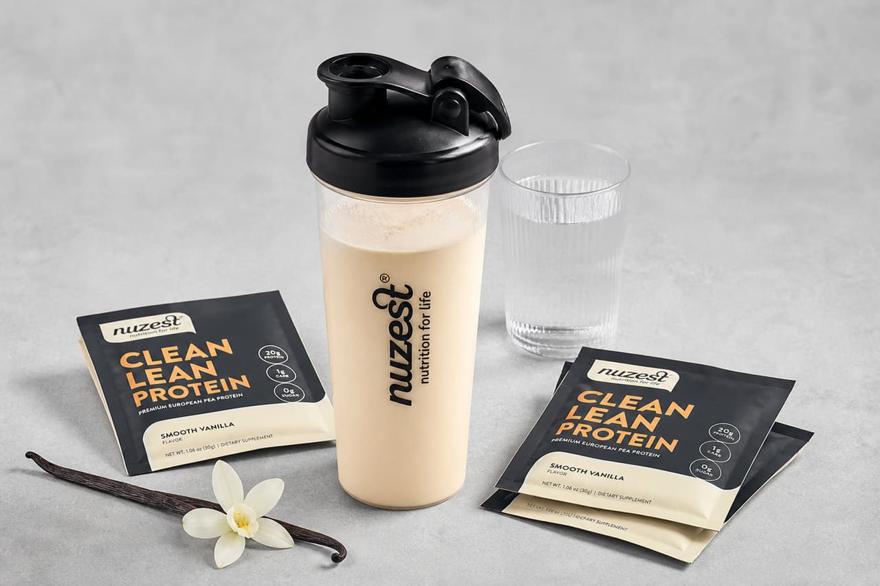 Nutritional Meal Replacement Shake and Packets on White Surface