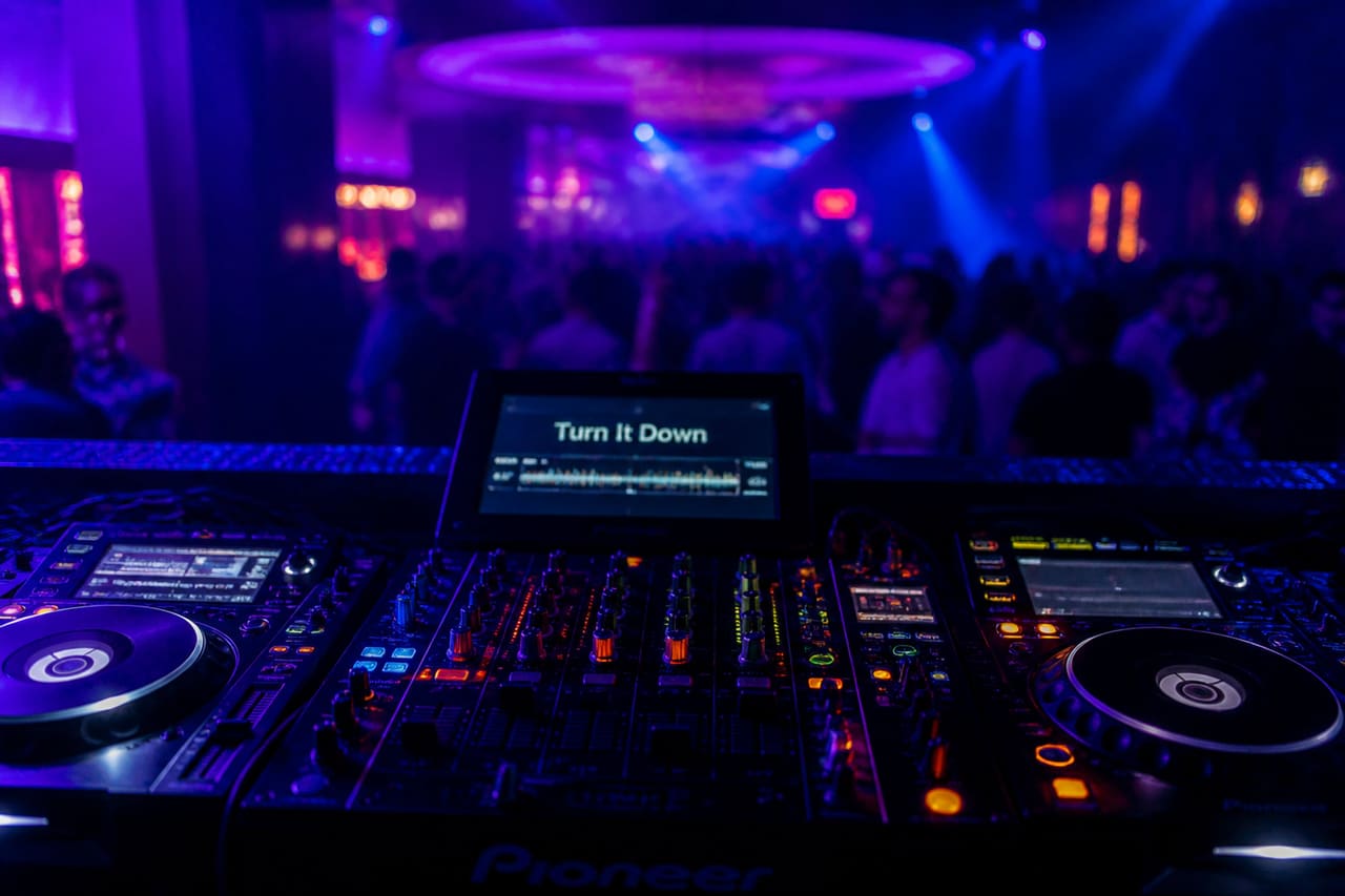 Professional Dj Mixer in a Neon Lit Nightclub