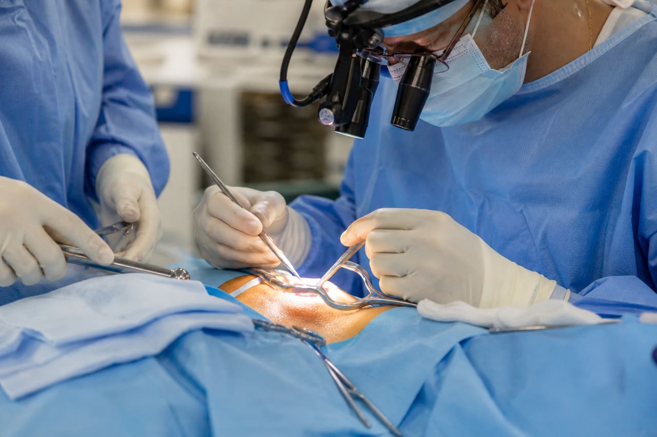 Surgeons Performing a Cervical Spine Procedure in a Modern Operating Room