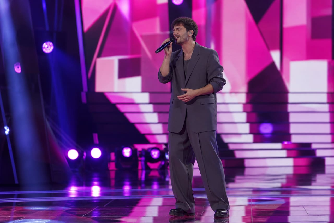 Singer Performing a Pop Song on a Modern Stage