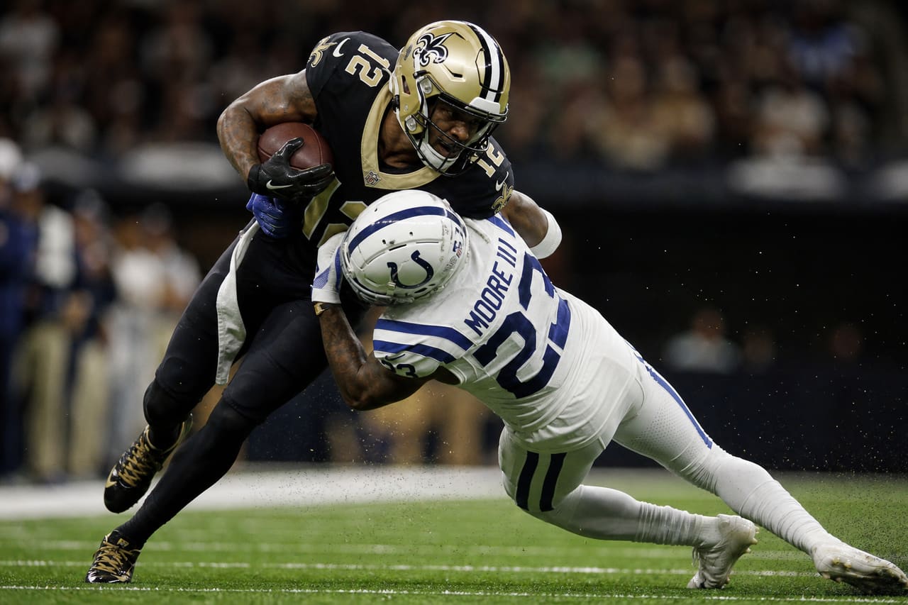 Professional American Football Players Competing During a Game
