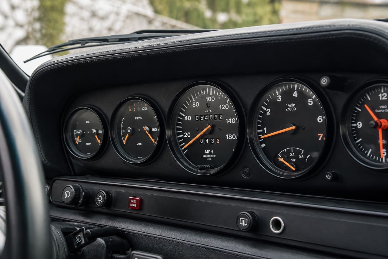 Classic Luxury Sports Car Dashboard with Analog Gauges