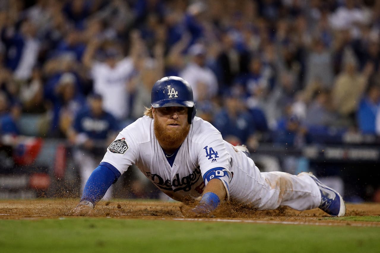 Professional Baseball Player Sliding Into Home Plate