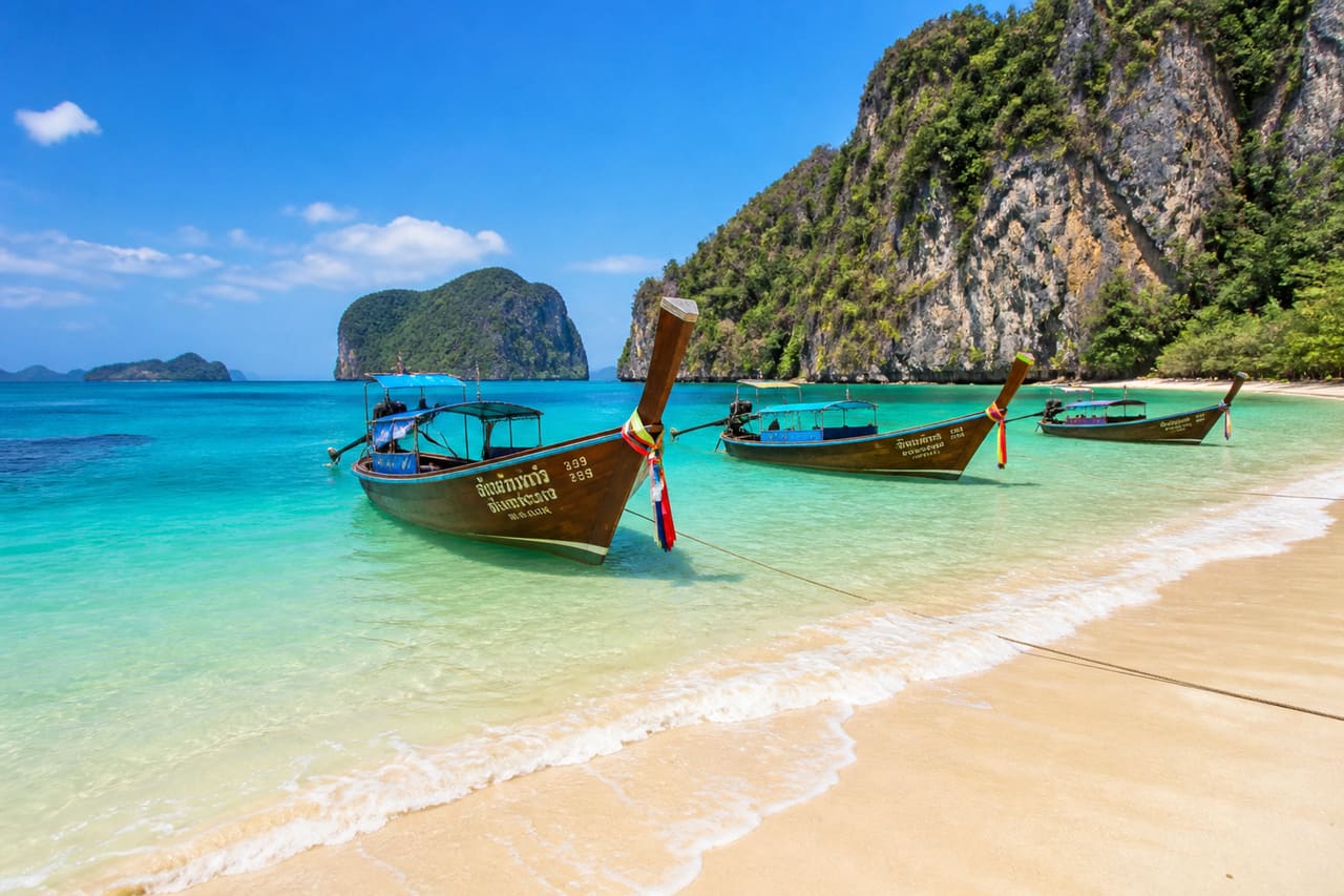 Long-Tail Boats on a Pristine Phuket Beach