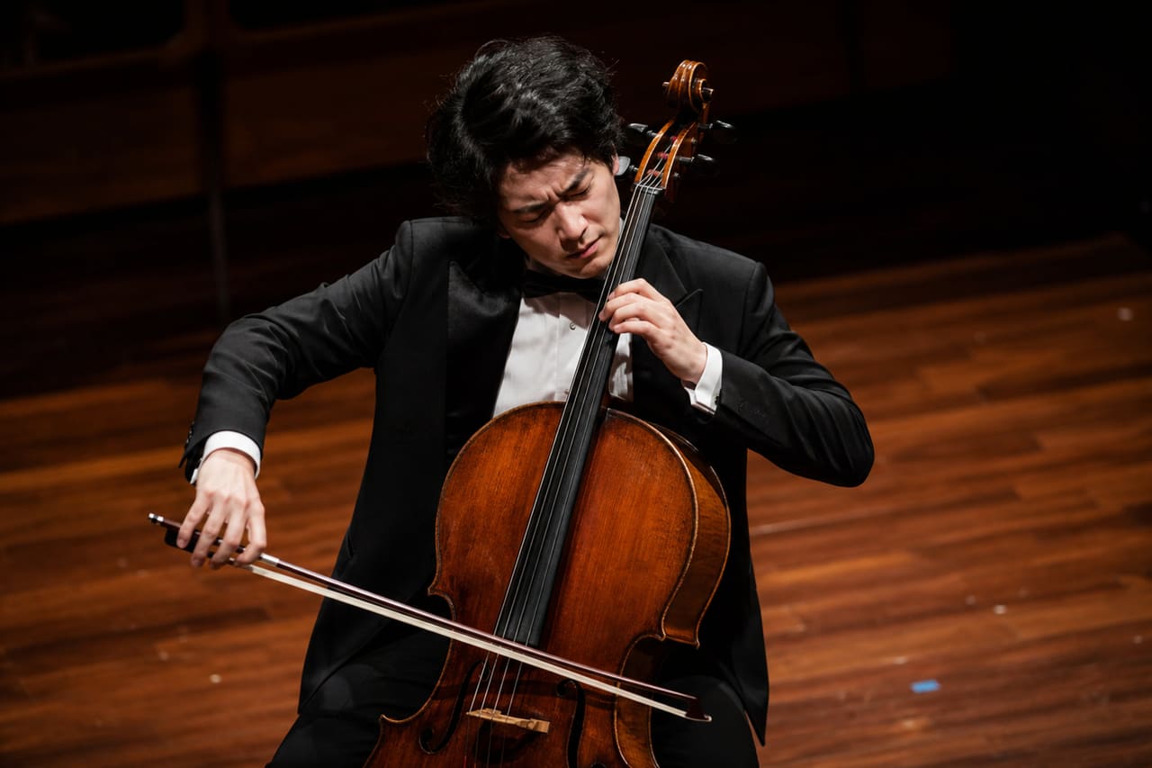 Cellist Performing During a Prestigious Cello Competition