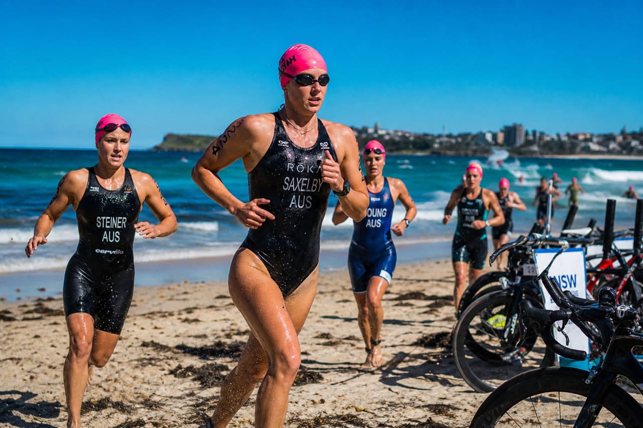 Triathletes Transitioning from Swim to Bike at Nsw Triathlon
